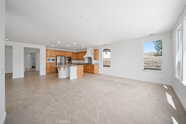 1824 Nathan Way, Nipomo, CA 93444 - unfurnished living room with healthy amount of natural light, recessed lighting, baseboards, and light colored carpet