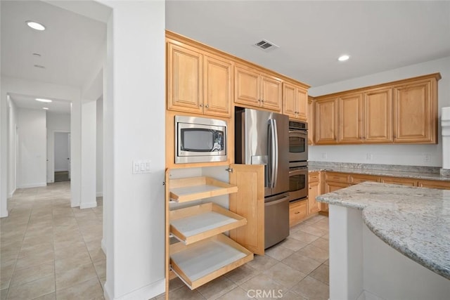 1824 Nathan Way, Nipomo, CA 93444 - kitchen with stainless steel appliances, light stone counters, light tile patterned flooring, recessed lighting, and baseboards