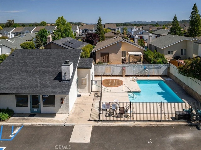 10710 El Camino Real Unit 17, Atascadero, CA 93422 - community pool featuring a residential view, a fenced backyard, and a patio area