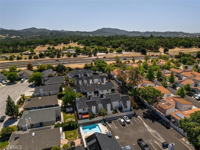 10710 El Camino Real Unit 17, Atascadero, CA 93422 - aerial view of residential area with a mountainous background and a pool area