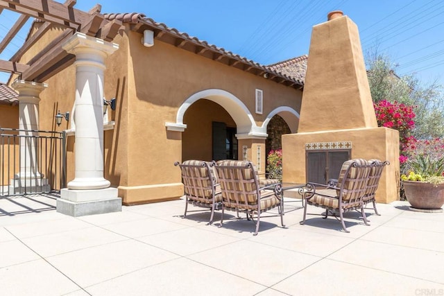 2772 Piantino Cir, San Diego, CA 92108 - view of patio / terrace with an outdoor fireplace