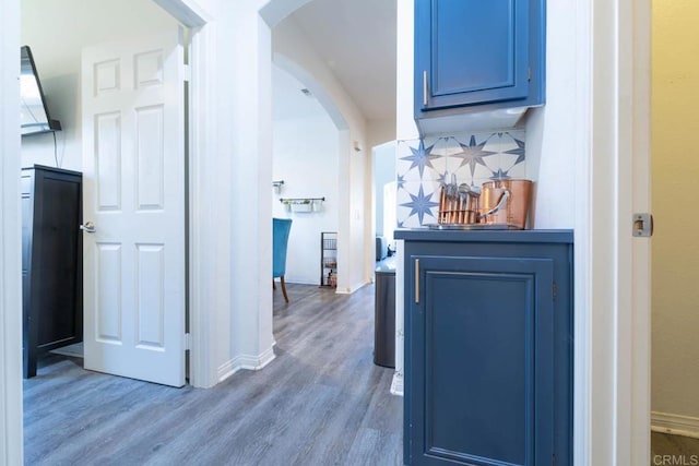 2772 Piantino Cir, San Diego, CA 92108 - corridor with arched walkways, wood finished floors, and baseboards