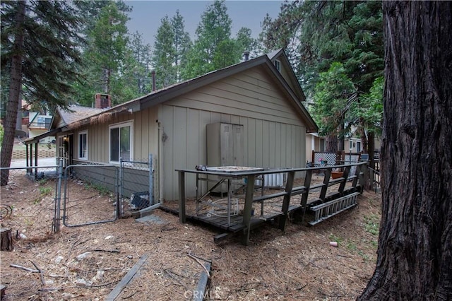 31510 Overhill Dr, Running Springs, CA 92382 - view of property exterior with a gate and a chimney