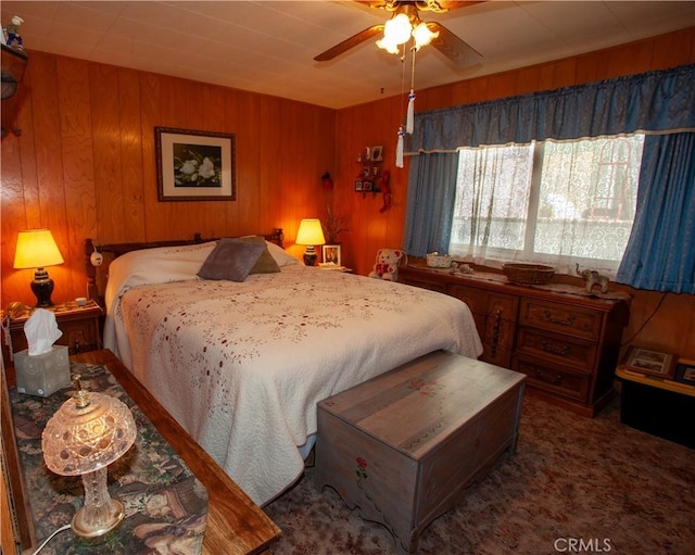 31510 Overhill Dr, Running Springs, CA 92382 - bedroom featuring wooden walls and a ceiling fan