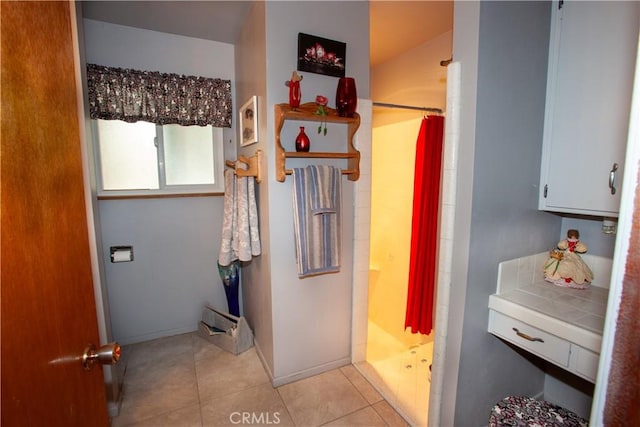 31510 Overhill Dr, Running Springs, CA 92382 - full bathroom with a stall shower, tile patterned flooring, and baseboards