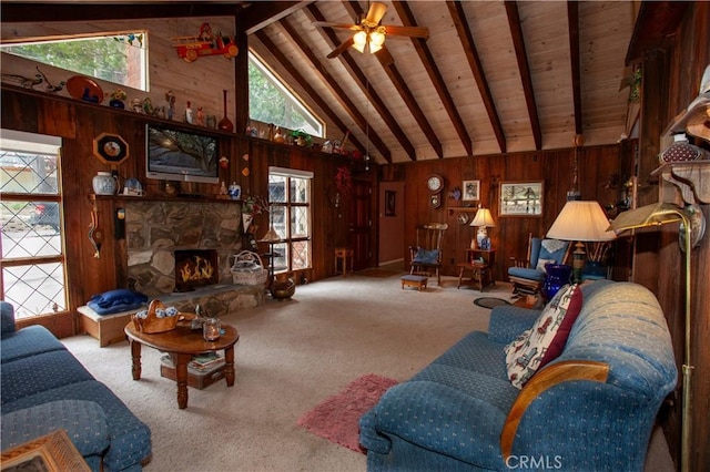 31510 Overhill Dr, Running Springs, CA 92382 - living area featuring wood walls, high vaulted ceiling, carpet floors, a fireplace, and a ceiling fan