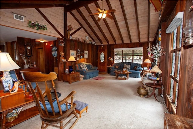 31510 Overhill Dr, Running Springs, CA 92382 - living room featuring wood walls, high vaulted ceiling, carpet floors, ceiling fan, and wooden ceiling with exposed beams