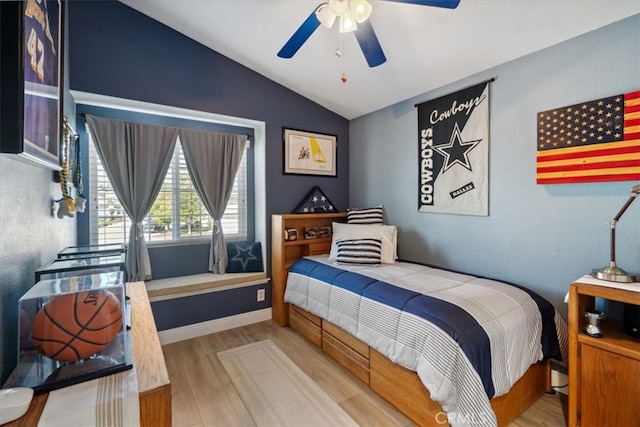 29159 Palm View Ln, Highland, CA 92346 - bedroom with lofted ceiling, wood finished floors, a ceiling fan, and baseboards