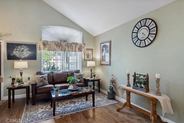 29159 Palm View Ln, Highland, CA 92346 - living room with vaulted ceiling, wood finished floors, and baseboards