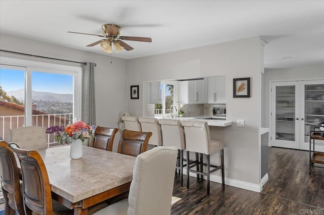 215 Cranston Crst, Escondido, CA 92025 - dining area featuring dark wood-type flooring, plenty of natural light, ceiling fan, and french doors