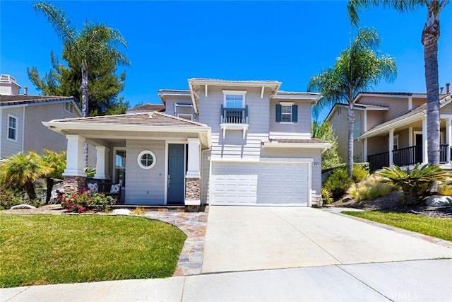 6121 Camino Forestal, San Clemente, CA 92673 - view of front of home featuring concrete driveway, a front lawn, a garage, stone siding, and a porch