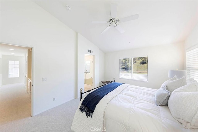 6121 Camino Forestal, San Clemente, CA 92673 - bedroom with light colored carpet, vaulted ceiling, ceiling fan, and ensuite bathroom