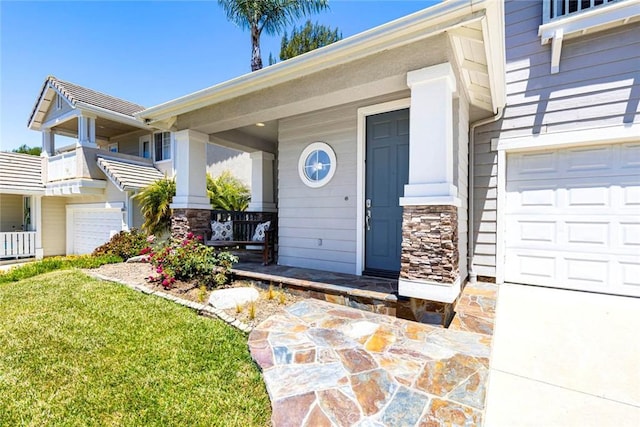 6121 Camino Forestal, San Clemente, CA 92673 - view of exterior entry with covered porch, stone siding, and a garage