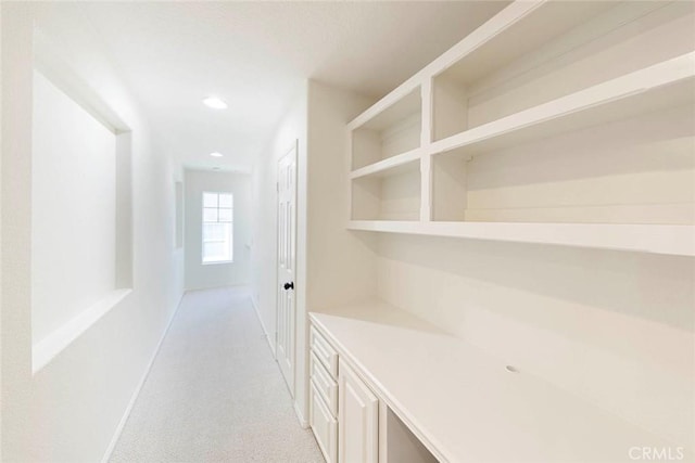 6121 Camino Forestal, San Clemente, CA 92673 - hallway featuring light carpet, baseboards, and recessed lighting