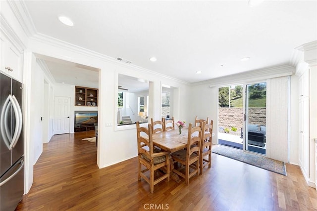 6121 Camino Forestal, San Clemente, CA 92673 - dining space with wood finished floors, ornamental molding, recessed lighting, and baseboards