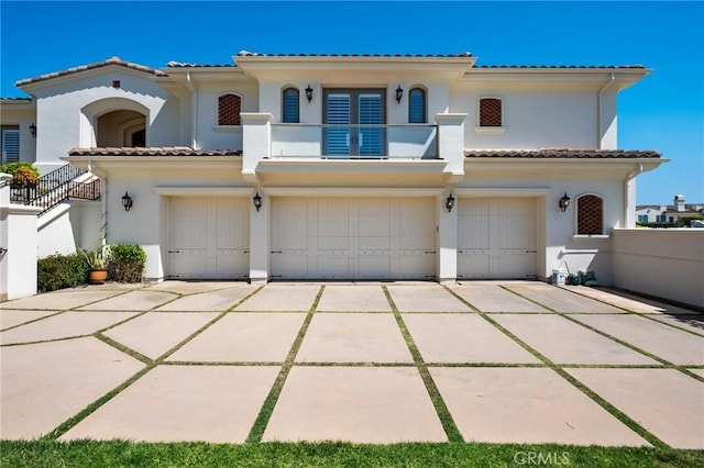20 Via Del Cielo, Rancho Palos Verdes, CA 90275 - mediterranean / spanish-style house with an attached garage, stucco siding, driveway, and a tile roof