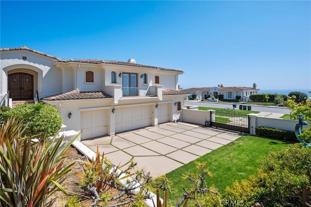 20 Via Del Cielo, Rancho Palos Verdes, CA 90275 - mediterranean / spanish home featuring a tile roof, a balcony, an attached garage, stucco siding, and concrete driveway
