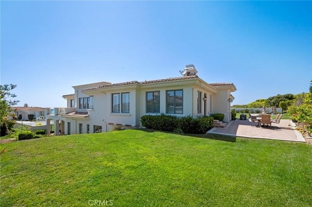 20 Via Del Cielo, Rancho Palos Verdes, CA 90275 - rear view of house featuring a patio, a chimney, stucco siding, a yard, and a tiled roof