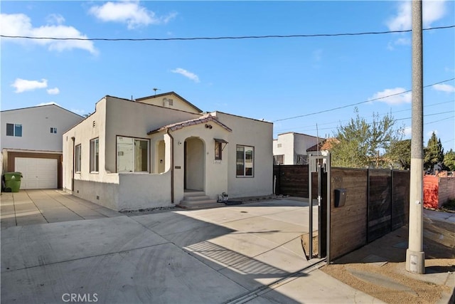 26021 President Ave, Harbor City, CA 90710 - mediterranean / spanish-style home with stucco siding and concrete driveway