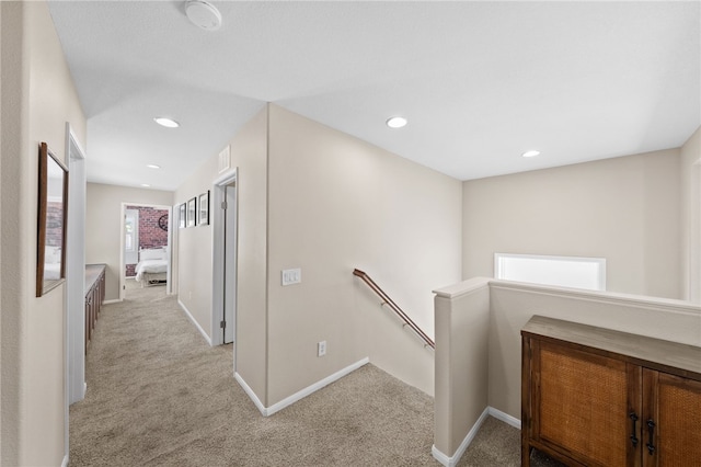 23650 Kathryn St, Murrieta, CA 92562 - corridor with an upstairs landing, light colored carpet, baseboards, and recessed lighting