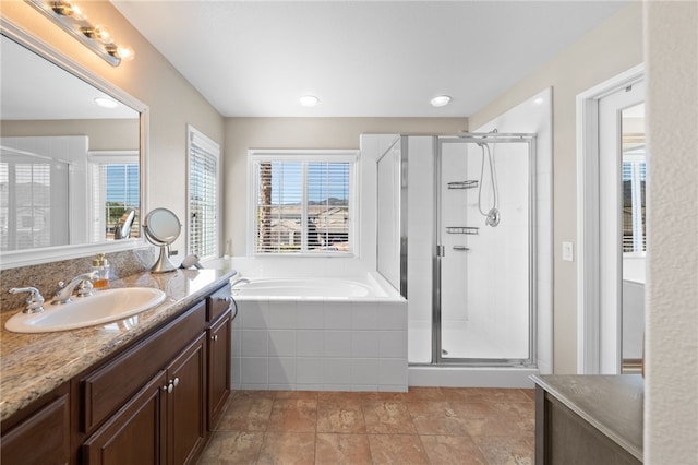 23650 Kathryn St, Murrieta, CA 92562 - bathroom with vanity, a stall shower, and a garden tub