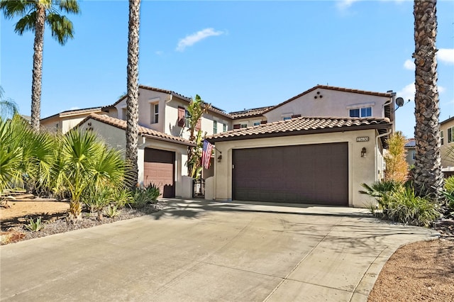 23650 Kathryn St, Murrieta, CA 92562 - mediterranean / spanish home with stucco siding, concrete driveway, a garage, and a tiled roof