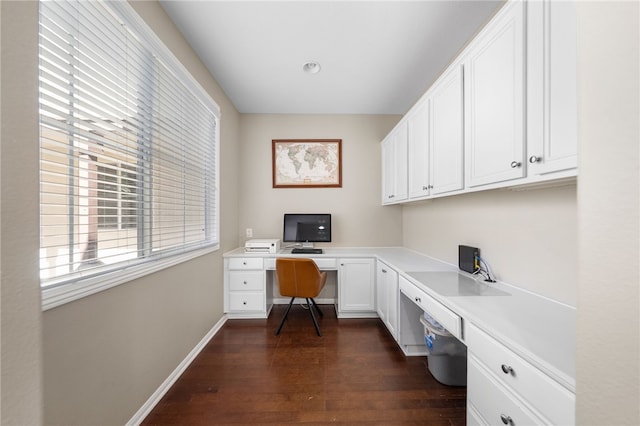 23650 Kathryn St, Murrieta, CA 92562 - home office with built in study area, dark wood-type flooring, and baseboards
