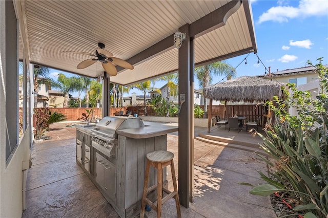 23650 Kathryn St, Murrieta, CA 92562 - fenced backyard with outdoor dining space, a patio, and a ceiling fan