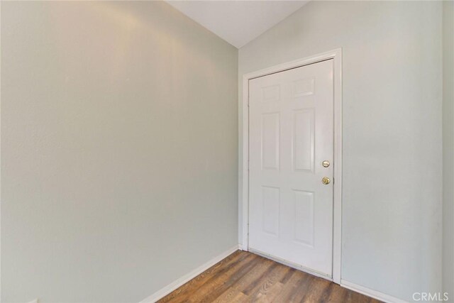 11241 Pleasant Hills Dr, Apple Valley, CA 92308 - doorway to outside with baseboards and dark wood-style floors