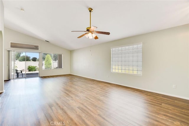 11241 Pleasant Hills Dr, Apple Valley, CA 92308 - empty room with a ceiling fan, wood finished floors, lofted ceiling, and baseboards
