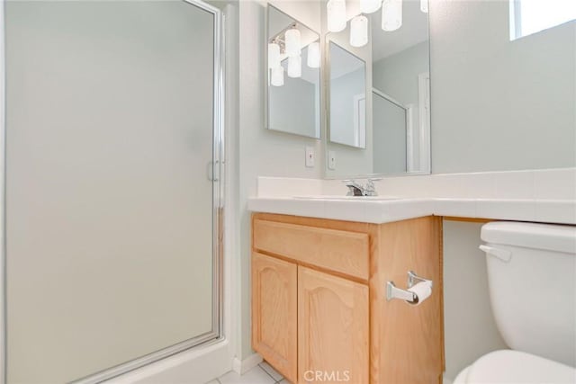 11241 Pleasant Hills Dr, Apple Valley, CA 92308 - bathroom with toilet, a stall shower, vanity, and tile patterned floors
