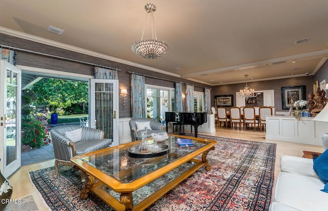 4409 Encinas Dr, La Canada Flintridge, CA 91011 - living room with a chandelier, crown molding, light wood finished floors, and french doors