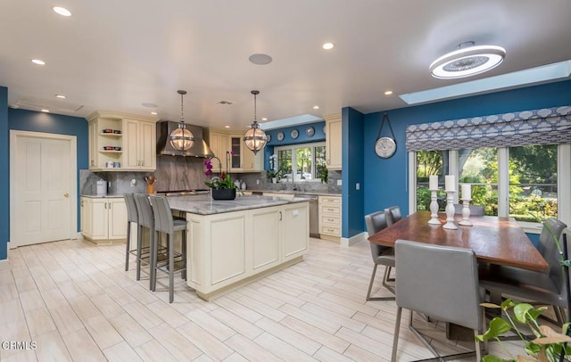 4409 Encinas Dr, La Canada Flintridge, CA 91011 - kitchen with wall chimney range hood, open shelves, a kitchen island, backsplash, and recessed lighting