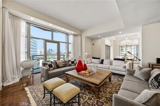 10776 Wilshire Blvd Unit 901, Los Angeles, CA 90024 - living room featuring a chandelier, healthy amount of natural light, a city view, dark wood-type flooring, and recessed lighting