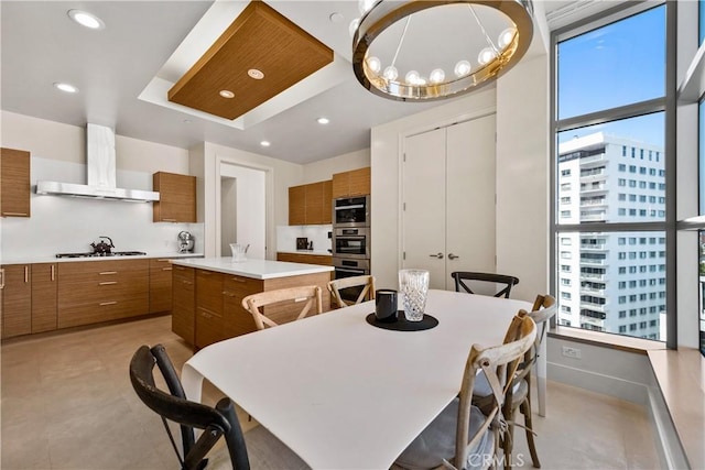 10776 Wilshire Blvd Unit 901, Los Angeles, CA 90024 - dining room with recessed lighting and a tray ceiling