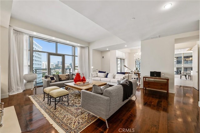 10776 Wilshire Blvd Unit 901, Los Angeles, CA 90024 - living room with a chandelier, wood finished floors, a view of city, and baseboards