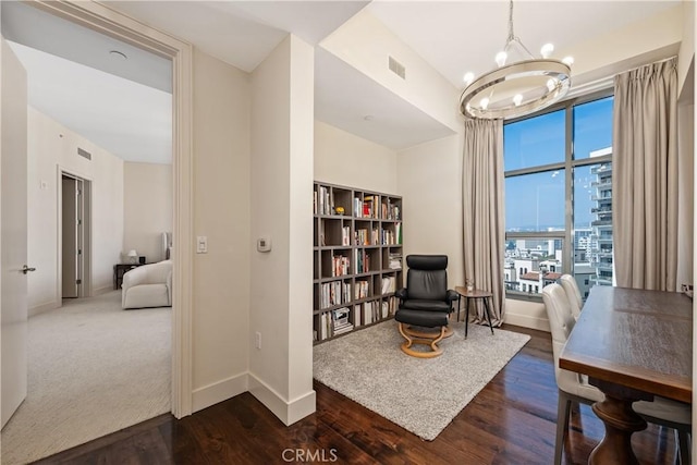 10776 Wilshire Blvd Unit 901, Los Angeles, CA 90024 - living area with baseboards, a chandelier, and dark wood finished floors