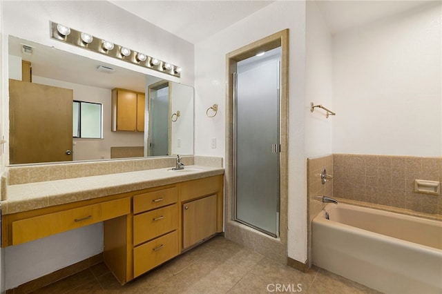 178 E Washington Ave, Chico, CA 95926 - full bathroom with vanity, tile patterned flooring, a garden tub, and a stall shower