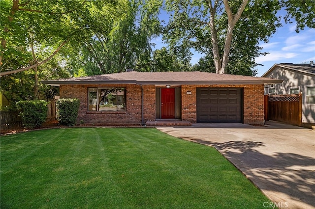 178 E Washington Ave, Chico, CA 95926 - ranch-style house featuring a garage, brick siding, and driveway