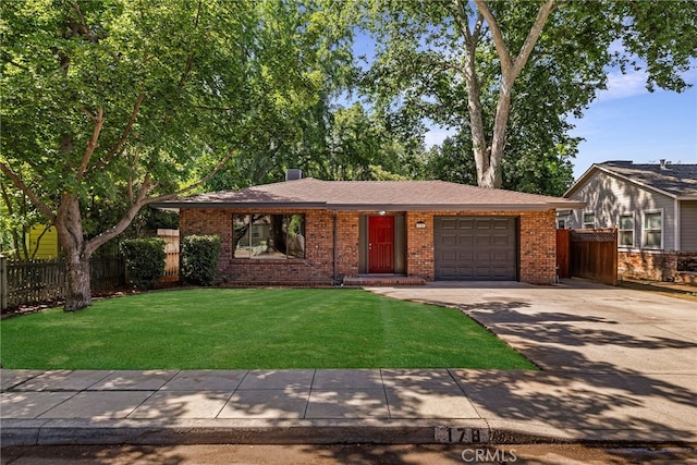 178 E Washington Ave, Chico, CA 95926 - ranch-style home featuring driveway, brick siding, and a garage