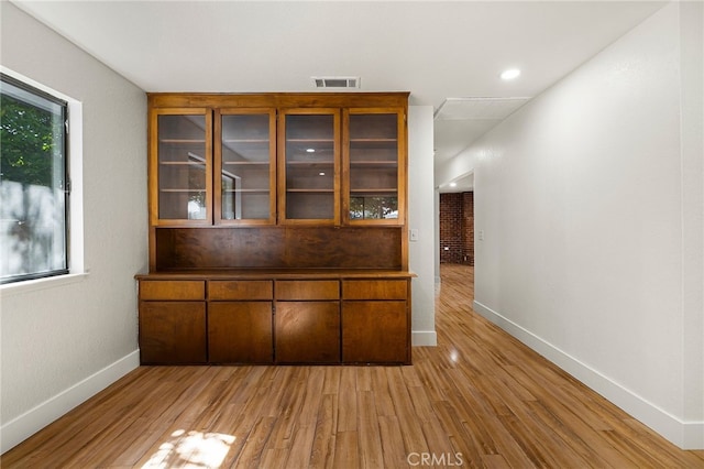 178 E Washington Ave, Chico, CA 95926 - unfurnished office featuring baseboards and light wood-type flooring