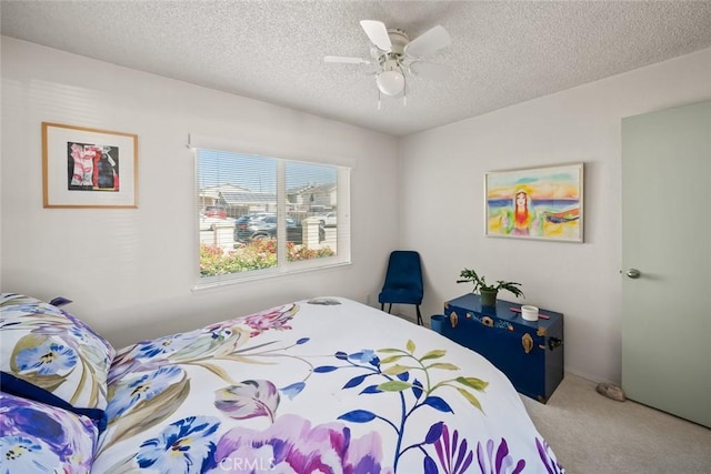 243 N 11th St, Grover Beach, CA 93433 - carpeted bedroom with a textured ceiling and a ceiling fan
