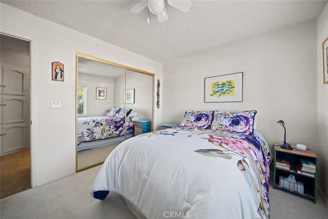 243 N 11th St, Grover Beach, CA 93433 - carpeted bedroom featuring a closet, ceiling fan, and a textured ceiling