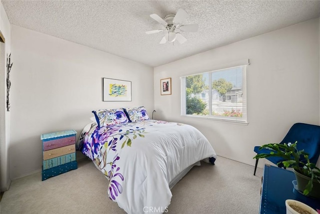 243 N 11th St, Grover Beach, CA 93433 - bedroom featuring carpet, a textured ceiling, and a ceiling fan