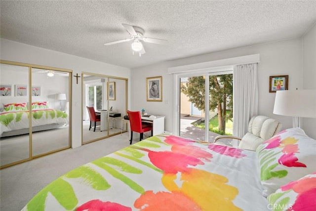 243 N 11th St, Grover Beach, CA 93433 - bedroom with two closets, access to exterior, carpet floors, a textured ceiling, and ceiling fan