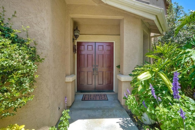 11983 Mountain Pass Rd, San Diego, CA 92128 - view of exterior entry with stucco siding