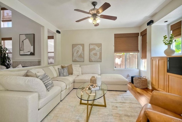 11983 Mountain Pass Rd, San Diego, CA 92128 - living room with light wood finished floors, healthy amount of natural light, and ceiling fan