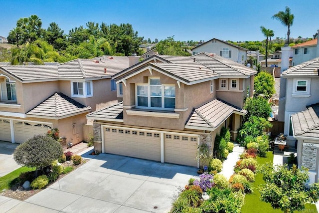 11983 Mountain Pass Rd, San Diego, CA 92128 - traditional home featuring a garage, driveway, a tile roof, and stucco siding