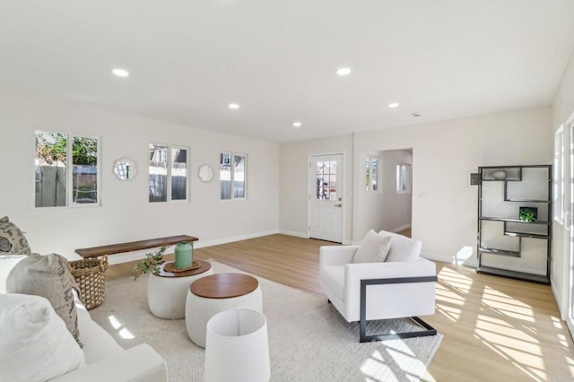 1740 Petra Dr, San Diego, CA 92104 - living area with light wood-type flooring, recessed lighting, and baseboards