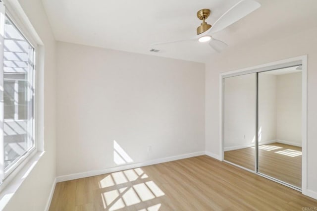 1740 Petra Dr, San Diego, CA 92104 - unfurnished bedroom featuring light wood-type flooring, a closet, and baseboards